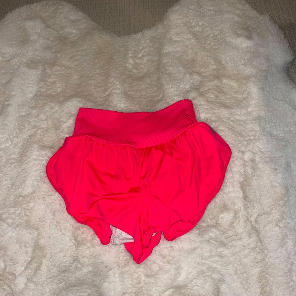 Hot pink free people game time shorts size xs good condition never worn.